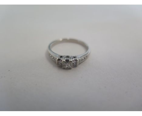 A 9ct white gold diamond ring, size J, approx 1.8 grams, some usage marks but generally good condition, diamonds bright 