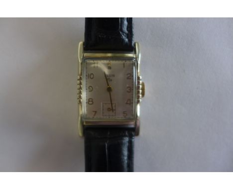 An Elgin 17 jewel manual wind gents wristwatch circa 19950 - 26mm wide including button, in good condition, running 