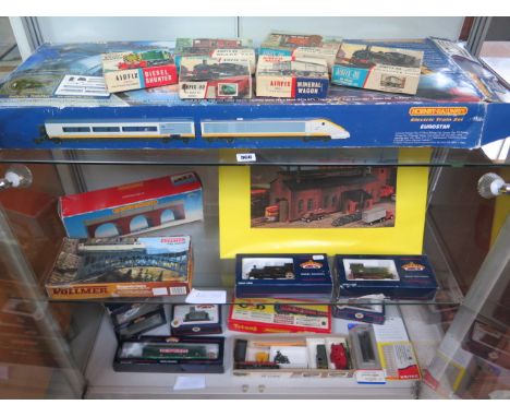 A good selection of OO gauge railway including a Hornby Eurostar set, con-Cor Heljan Engine house, two boxed Bachmann logos, 