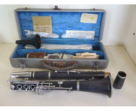 A Boosey and Hawkes rosewood clarinet, serial number 36651, with fitted hard case - in good condition, some usage marks 