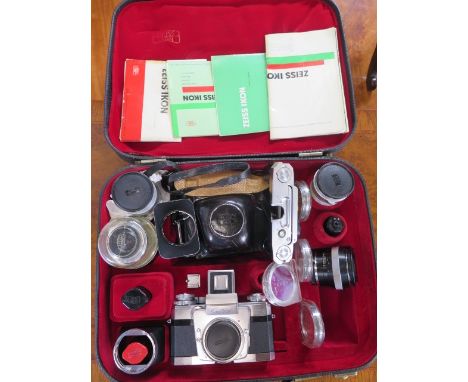 A Zeiss Ikon Contarex camera x system kit wit case, three lenses and attachments 