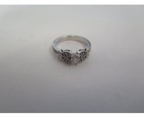 An 18ct white gold diamond ring, size J/K, approx 4.5 grams, some usage marks but generally good, condition diamonds bright 