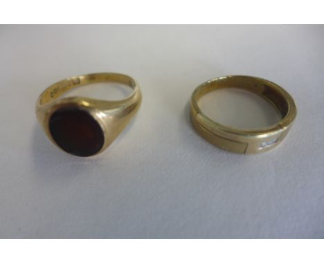 A 9ct gold diamond ring, size V, and a gents 9ct gold ring inset with a hard stone, size I, overall approx 11.1 grams - both 