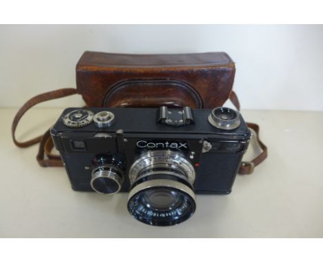 A Zeiss Ikon Contax rangefinder camera with Carl Zeiss 5cm lens and leather case 