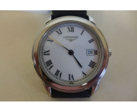A gents Longines steel quartz watch on a new leather strap, in Longines box, 36mm without button, good clean condition with l