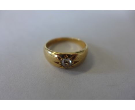 An 18ct yellow gold single stone diamond ring, size N, approx 5.7 grams, some general usage wear 