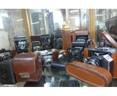 Nine vintage Bellows cameras, including Zeiss Ikons and Kodak and a small Zeiss Ikon box camera 