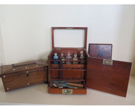 A 19th century mahogany medical travel box and a 19th century tea caddy, both need some restoration 