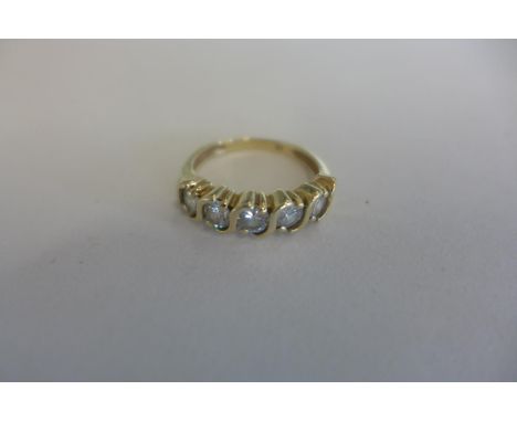 A hand made, yellow gold, five stone diamond ring, diamonds - 4mm round brilliant cut, clarity VS-SI, colour F-G, total appro