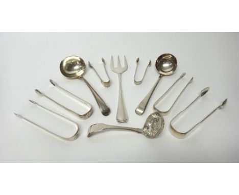 Silver flatware, comprising; two sauce ladles, London 1800 and 1786, a sugar sifting spoon, probably London 1815, a bread for