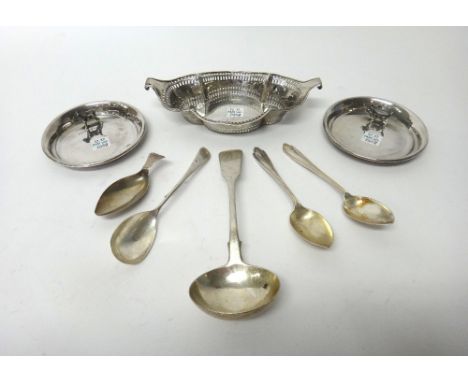 Silver, comprising; a pair of circular dishes, each with a differing standing dog motif, London 1922, a bonbon dish, of lobed