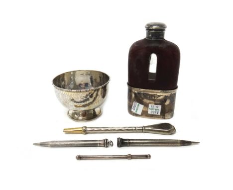 A George IV silver mounted partly leather covered glass spirit flask, with a pull-off beaker base, London 1828, a silver bowl