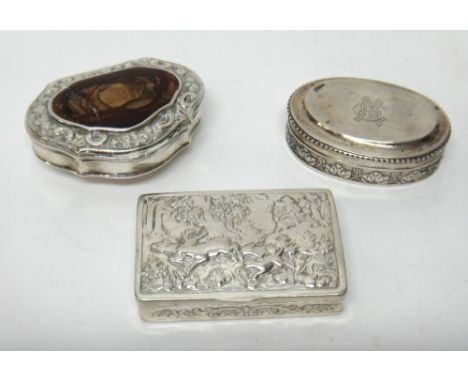 A mid 18th century silver mounted brown agate cartouche shaped hinge lidded snuff box, gilt within, the underside engraved 'M