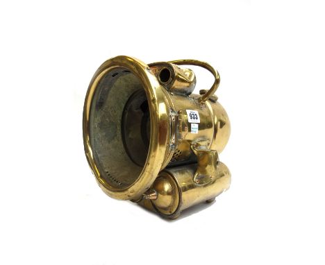 A brass Lucas King of the Road Duplex lamp, (a.f), a T. Cooke & Sons theodolite, cased, an early 20th century set of brass sc