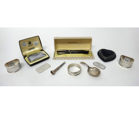 Silver and silver mounted wares, comprising; a heart shaped pin cushion, Birmingham 1911, a tea caddy spoon, with a shell sha