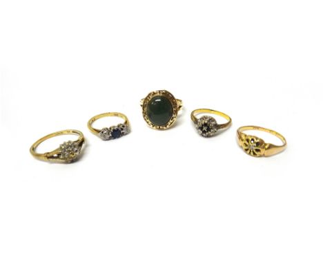 An 18ct gold, sapphire and diamond cluster ring, mounted with four circular cut sapphires within a diamond set surround, a go