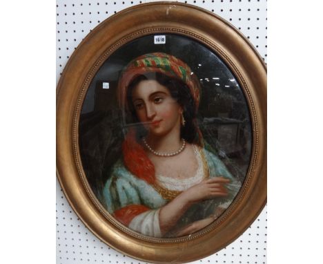 Continental School (late 19th century), Portrait of a girl in Turkish dress, oil on canvas, reverse laid on convex glass, ova