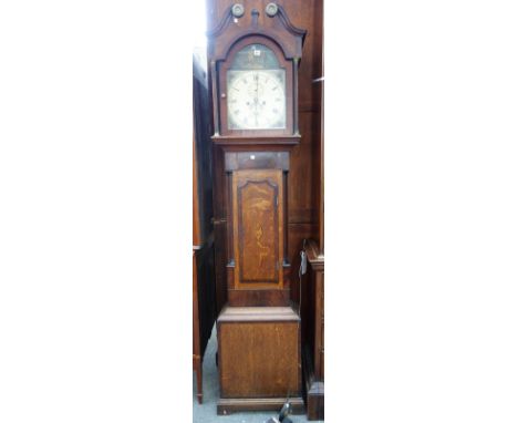 A George III oak and crossbanded longcase clock, J. Bright, Saxmundham, with a swan neck pediment above a conch shell inlaid 