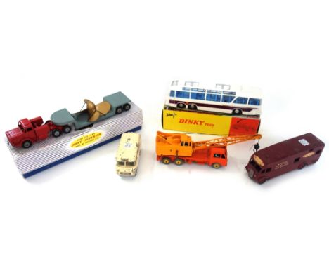 A Dinky 952 Vega Major luxury coach, a Dinky 986 Mighty Antar low loader with propellor, a 555 fire engine (boxed), a 978 ref