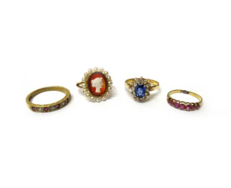 A gold and ruby set seven stone ring, mounted with a row of graduated rubies, a French gold, banded agate cameo and seed pear