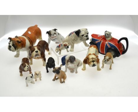 A box of assorted bulldogs including a Wedgwood black basalt dog, 7 cm h., two Sylvac dogs, 13.5 & 8.5 cm h., a Goebel dog, 1