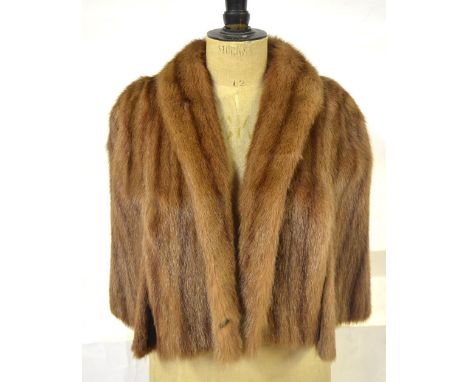 A shadowed light brown fur evening shoulder cape retailed by Maxwell Croft, London & Bath