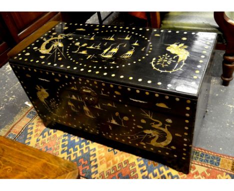A Chinese mother-of-pearl inlaid stained hardwood trunk with camphorwood lined interior, 59 cm high x 106 cm x 52 cm