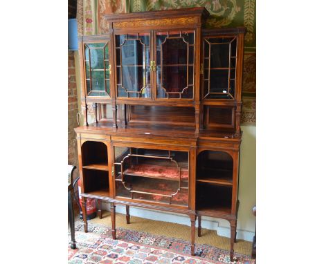 A good quality inlaid rosewood display cabinet in the manner of Edwards & Roberts, the stepped top having a dentil moulded co