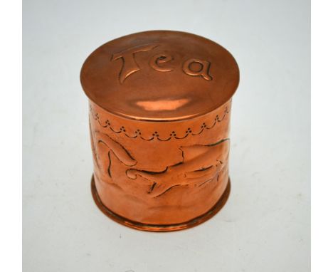 A Newlyn copper cylindrical tea caddy with riveted seam, embossed with fish, the cover embossed 'Tea', 7 cm high, stamped 'Ne