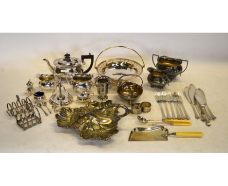 An Elkington & Co electroplated patent nut-cracker with screw action, to/w a three-piece tea service, trefoil nut dish and ot