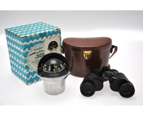 A leather cased pair of Carl Zeiss 8 x 30 binoculars to/w an Airguide marine compass model 66.F (unboxed) (2) Condition Repor
