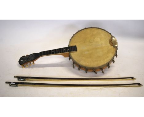 A banjolele with stretched skin drums and ebony fret-board, to/w a German violin with 'Stradivarius' label, 34 cm, two-piece 
