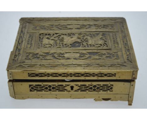 A Napoleonic Prisoner of War-work bone trinket box, the hinged top richly carved with a deer-hunting scene, urn and foliage, 