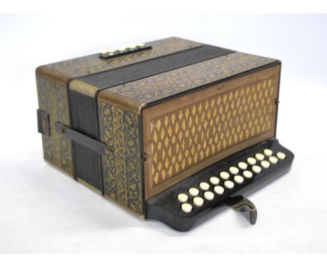 A Hohner button accordion with stencilled gilt decoration and eight base-buttons, 28 cm wide