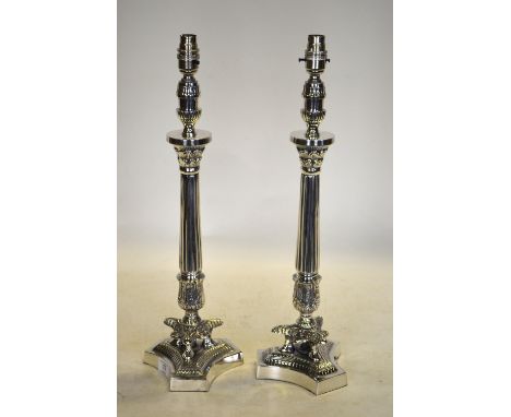 A pair of electroplated Empire style column table lamp-bases, 52 cm