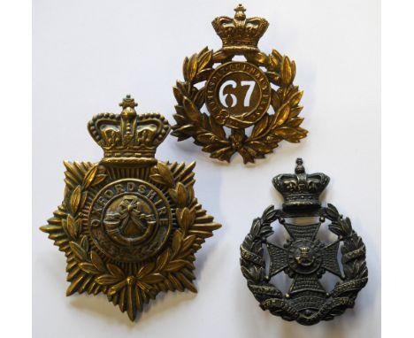 A trio of Victorian regimental helmet plates - a brass 67th Regiment of Foot (South Hampshire); The Rifle Brigade (Price Cons