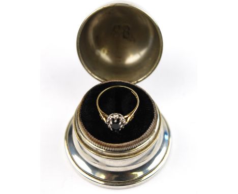 A US Birks Sterling bell-shaped ring-box with 'BHB' monogram to hinged cover, containing a 9ct gold ring set with sapphire an