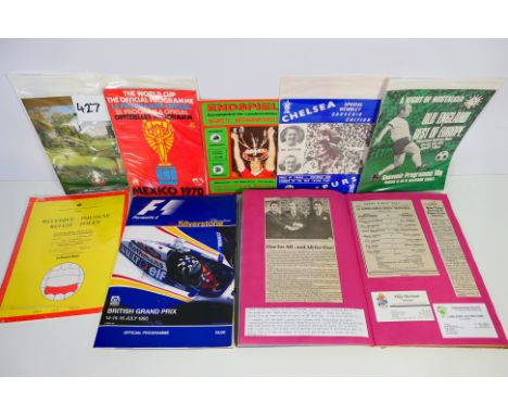 Sporting Programmes, Includes 1960s football special editions, Signed golf programme, F1
programme, old boxing scrapbook, wel