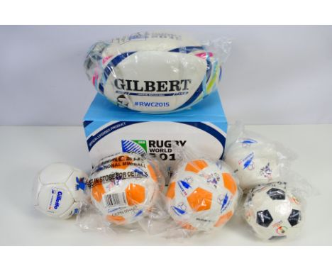 Lot to include a boxed Gilbert Rugby World Cup 2015 rugby ball and five France 98 World Cup promotional footballs. [W]