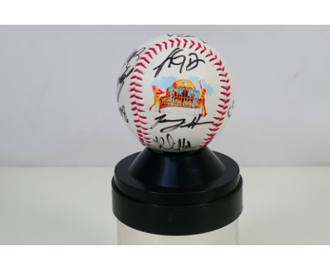 Signed Baseball, Multi signed Atlanta Braves Baseball, circa 2012, signed at spring training, sold in case (1) Very Good