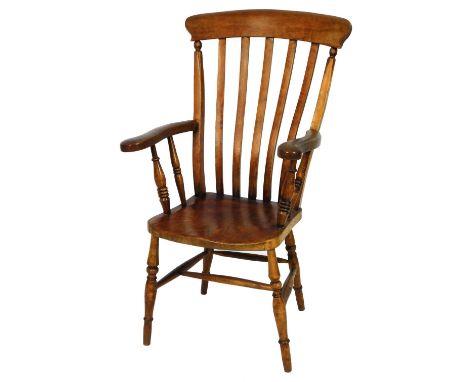 A 19thC ash and elm lath back grandfather chair, with comb top, S shaped vertical splat, shaped arms and seat, on turned fron