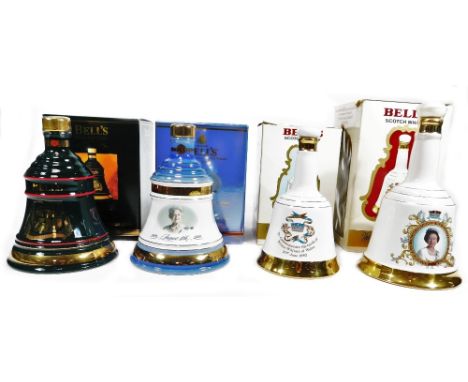 Four various Wade Bells Scotch whisky decanters, to include Christmas 1994, 21cm H, etc.  (4)