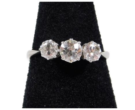 A three stone diamond ring, with three round brilliant cut diamonds, the central stone measuring 4.4mm x 4.4mm x 2.6mm, appro