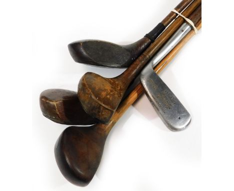 Five various hickory shafted golf clubs, comprising a rare Spalding Issac Mackie patent, partially stamped, 105cm, R Simpson 
