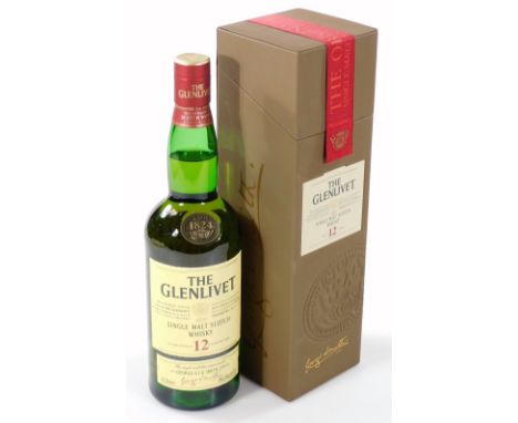 A bottle of Glenlivet 12 Year Old single malt Scotch whisky, 70cl.  (in paper wrapper and outer box)