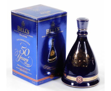 A Bells 50 Year's Reign Queen Elizabeth II limited edition decanter 1952-2002, with stopper, contents and outer box, 25cm H.