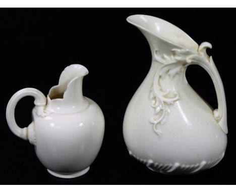 A Royal Worcester ewer no. 1439, undecorated, and a further jug. (2)