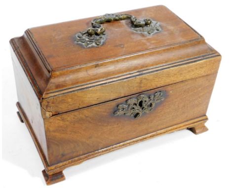 An George III mahogany tea caddy, of rectangular form, with elaborate escutcheon and handle, on stylized bracket feet, 16cm H