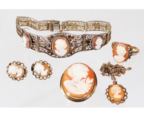 Various cameo set jewellery, comprising a 9ct gold cameo dress ring, ring size M, 3g all in, a continental silver filigree ca