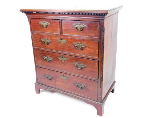 An late 18thC mahogany chest, of two short and three long cockbeaded drawers flanked by a blind fret on bracket feet, with pl